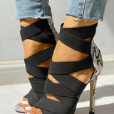 high heels with snake pattern