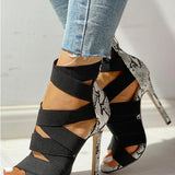 high heels with snake pattern